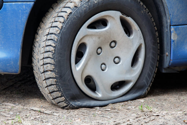 symbolic meaning of a flat tire